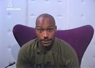 Darren talking to Big Brother in the Big Brother 1 Diary Room
