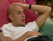 Ray sits in the Big Brother 4 seating area