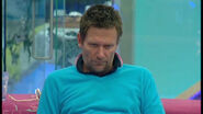 Nick sitting in the Ultimate Big Brother living area