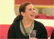 Justine laughing in the Big Brother 4 House