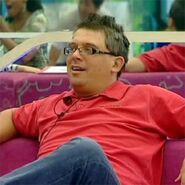 Dave sitting in the Big Brother 11 living area