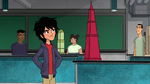 Hiro looks at his building