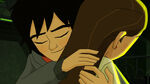 Hiro smiles while hugging Karmi