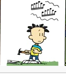 Nate Wight holding a hammer.