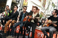 BTR performing at The Grove.