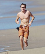 Kendall running on the beach