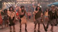 BTR performing as cavemen in "Big Time Love Song"