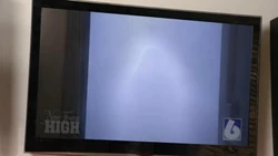 A faint figure, symbolizing the return of someone in a shot of the show