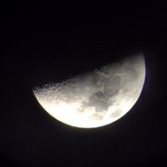 Carlos: "@kendizzzzle and me looking at the moon..Took this pic with an iPhone looking into a telescope... Sick!!!"