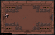 A room with ten coins, 2-3 in each corner, walled off by rocks.