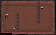 Two Hoppers, each hugging a wall with columns of rocks and a pile of poop at opposite corners.