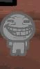 La cara parecida a Trollface.