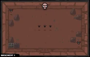 Three Black Flies with a Pooter at opposing corners of the room. A pair of rocks appear at the other opposing corners, with one of them enclosing a chest.