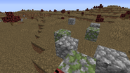 Tundra in 1.15.2. Grass was made slightly less red, there are no boulders, just small rocks, and bushes are replaced with scrubs.