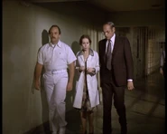 Weber, Dr. Harkens and Warden Cooper about to confront Jaime's claim she is not Lisa Galloway