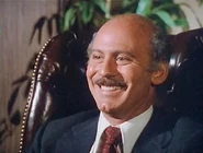 Alan Oppenheimer as Rudy Wells