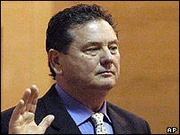 McLarty testifies in court, 2003.