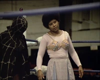 "Battling" Betty Madison (r), and her wrestling partner, The Mysterious Spider Lady (l).