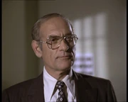 Warden Cooper played by 