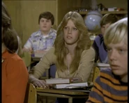 Jody Warner patiently awaits for class to begin.