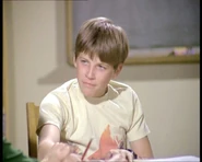 Arty delights in rocking a broken jail in "Beyond the Call"