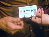 7mil-tape.jpg (33 KB) Carla gives someone classified materials.