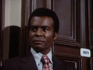 Agent Bristol guards Cameron