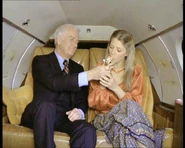 Dr. Courtney and Lisa Galloway conspire on their flight to Ojai, CA.