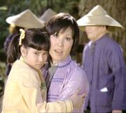 Kim Cross and her mother in a Vietnamese village.