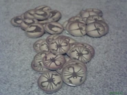 57 Rahi tokens (on the back side is their worth points)