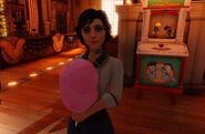 Elizabeth tries out some cotton candy.