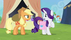 The Lutece ponies appear in the background on the right.