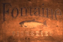 The Fontaine Fisheries' logo printed on the side of a crate.