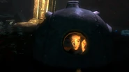 Closeup of the child figure at the end of Journey to the Surface.