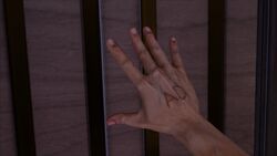 The "AD" brand on Booker's hand.