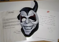 A Grinning Devil mask.