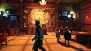 An early version of the parlor, with a different floor and posters on the wall.