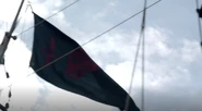 Vane's flag flying over his schooner.