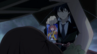 Rentaro shows a picture of Enju