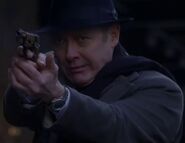 Red taking aim to shoot Ressler.