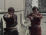 Blake and Avon firing weapons Weapon