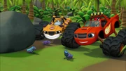 Blaze and Stripes bug hunting at the start of the episode.