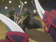 Hisagi and Kira arrive to help Renji and Ichigo.