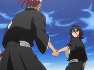 Renji stops Rukia from interfering in the fight.