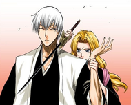 Rangiku restrains Gin.