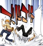 Isshin crashes into the ground next to Ichigo.