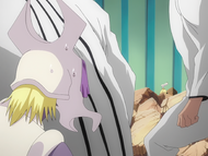 Pesche sees Dondochakka's foot sticking out of the rubble.