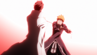 Aizen grabs Tensa Zangetsu by the blade when Ichigo attacks him.