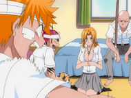 Renji is startled when Rangiku attempts to convince Ichigo to let her stay with him.