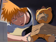 Ichigo finds a taped-up Kon.